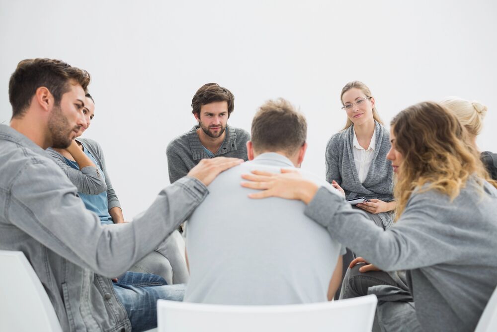 a group therapy session covered by Lucet Behavioral mental health rehab insurance